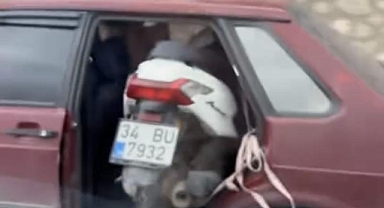 Kapısız araçta motosiklet taşıdı,