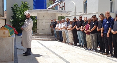 Evinde ölü bulunan yarış spikeri toprağa verildi